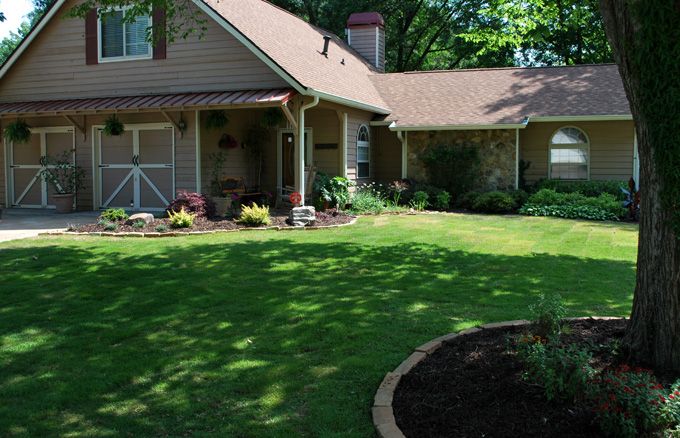 Home with a green lawn